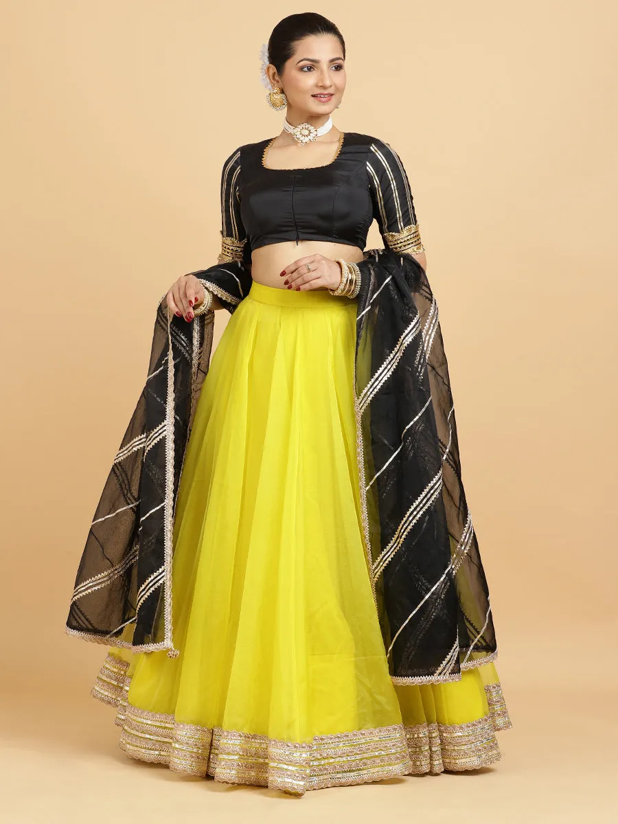 Farah Aziza 4-Pc Lehenga Set x Tyohaar | Lemon Yellow Lehenga, Charcoal Black Blouse with Chandni Black Dupatta and Cancan Skirt