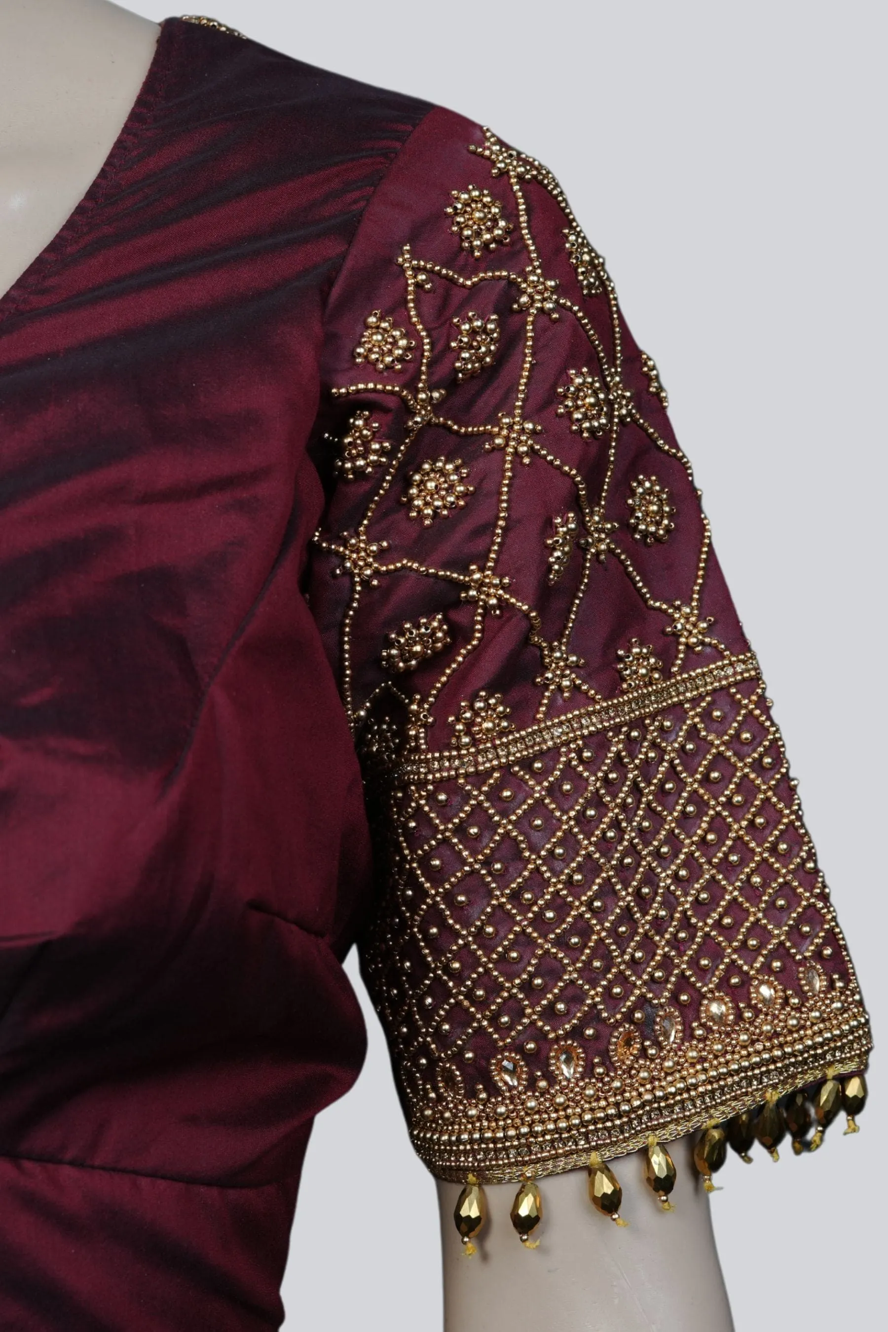 Luxurious Aari-Work Bridal Blouse with Fancy Tassels by JCS Fashions