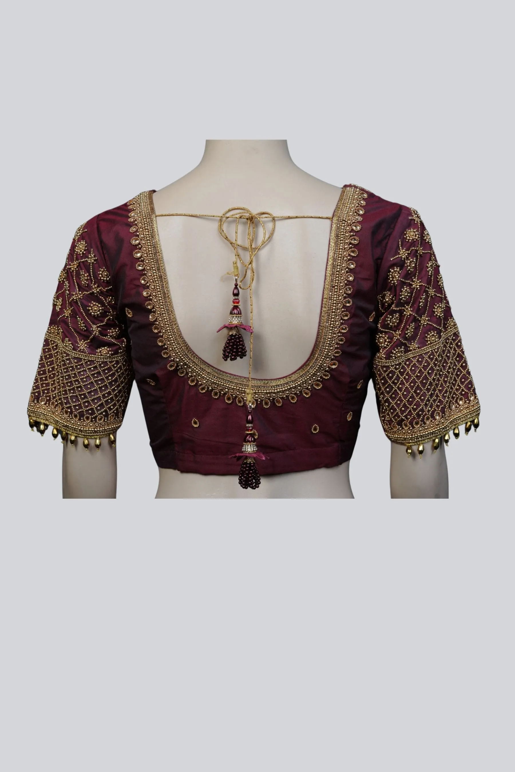 Luxurious Aari-Work Bridal Blouse with Fancy Tassels by JCS Fashions