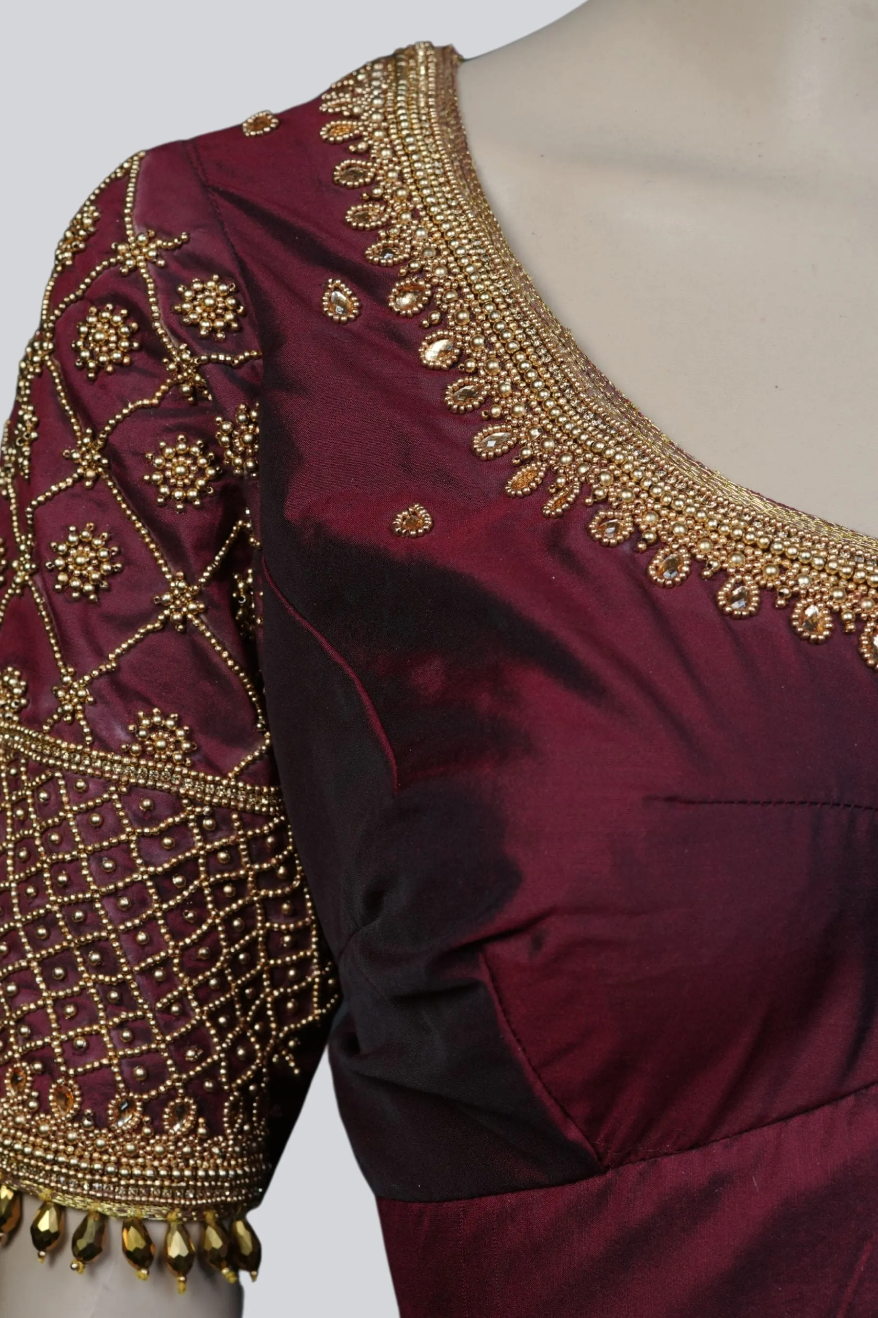 Luxurious Aari-Work Bridal Blouse with Fancy Tassels by JCS Fashions